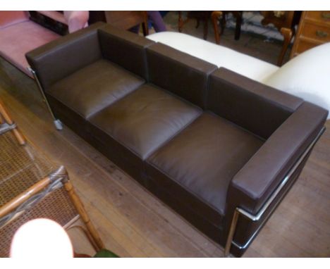 A modern Le Corbusier brown three seater sofa with chrome frame.