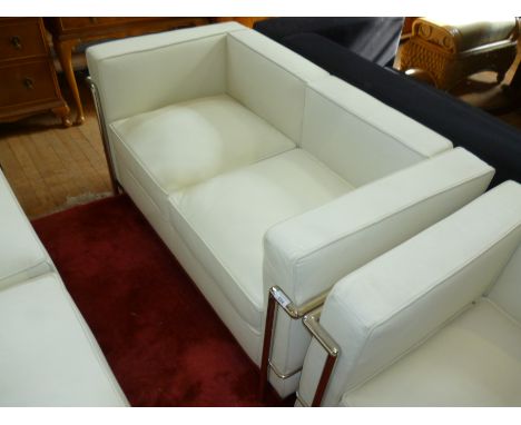 A modern Le Corbusier white two seater sofa with chrome frame.