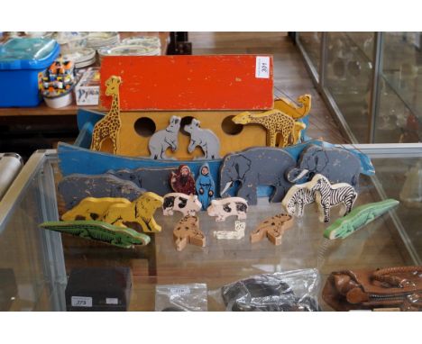 A vintage Noahs ark complete with wooden animals.
