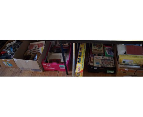 A large quantity of assorted toys, games and books to include Scaleatrix track, Thomas the Tank Engine train set, vintage car