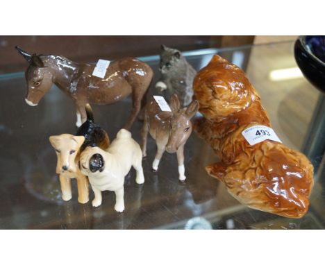 A mixed group of ceramics to include two Beswick models of dogs and two further Beswick donkey models together with a Royal D