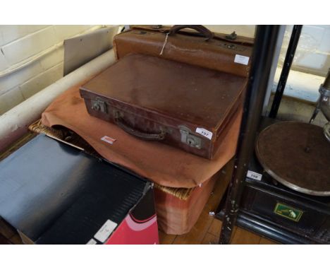 A collection of vintage luggage, to include a lacquered canvas tan leather suitcase with brass fittings, 15cm x 50cm x 36cm, 
