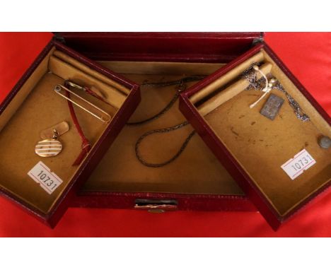 A bar brooch, together with a single enamel cufflink, to a red jewellery box