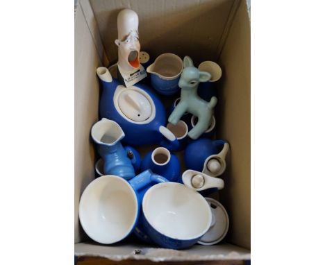 A German porcelain match striker together with a Fosters pottery tea service and a Denby model of doe.