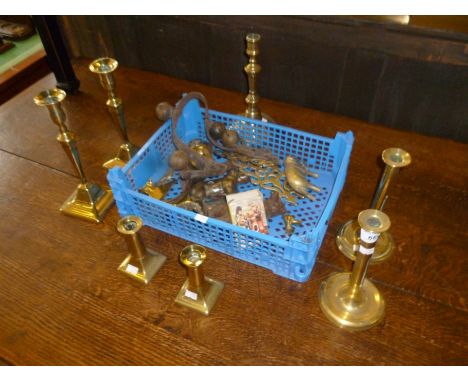 Three pairs of 19th Century brass candlesticks together with a further candlestick.
