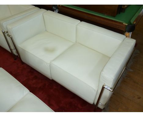 A modern Le Corbusier white two seater sofa with chrome frame.