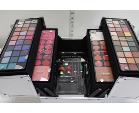 A Professional Care 100 piece make up set, Cased one shelf slight damage 