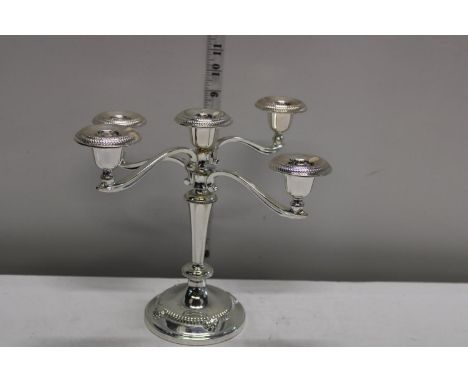 A silver plated candlestick 