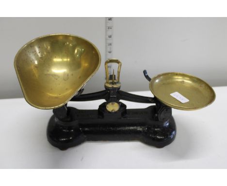 A Set of Cast Iron and Brass kitchen Scales 