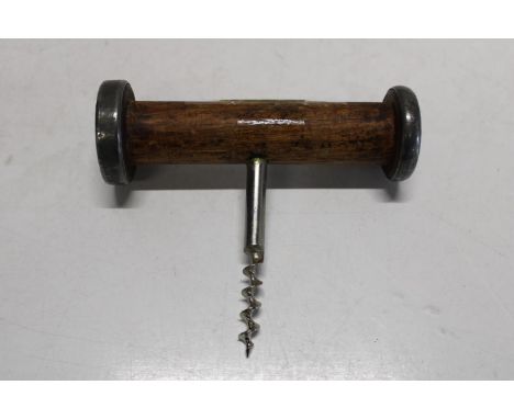 A hand made corkscrew made from a mill bobbin 
