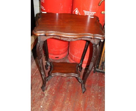 An Edwardian occasional table in mahogany with under shelf collection only. 75cm tall 