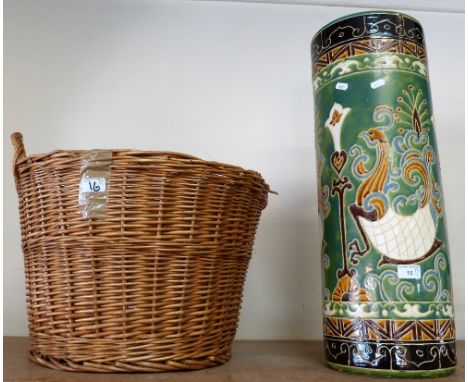 A ceramic stick stand together with a wicker log basket (2)