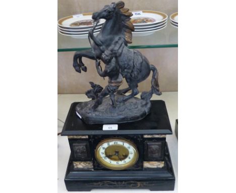 A slate mantle clock with spelter Marly rearing horse figure to top