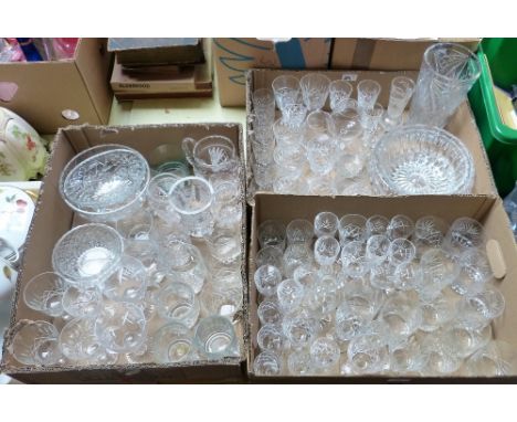 Three boxes of glassware, predominantly cut glass drinking glasses