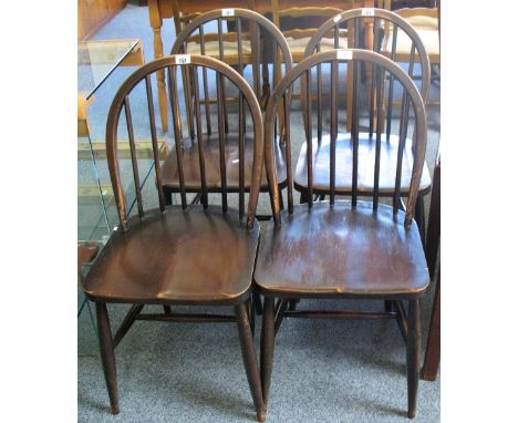 A set of four Ercol stick back kitchen chairs (4)