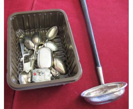 A George III silver toddy ladle, marks worn, two silver needles, six tea spoons, a vesta case and an electroplated pill box