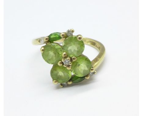 A 9ct gold, peridot and white stone ring, 2.9g, M