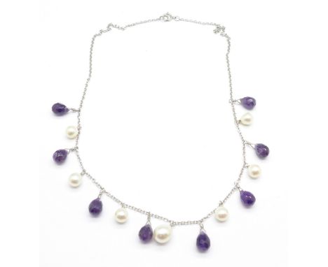A silver, pearl and amethyst necklace