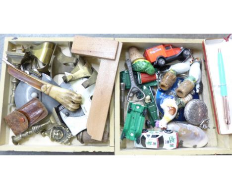 Assorted items including model vehicles and novelty bottle stoppers