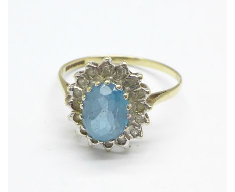 A 9ct gold, blue topaz and diamond ring, 1.9g, P