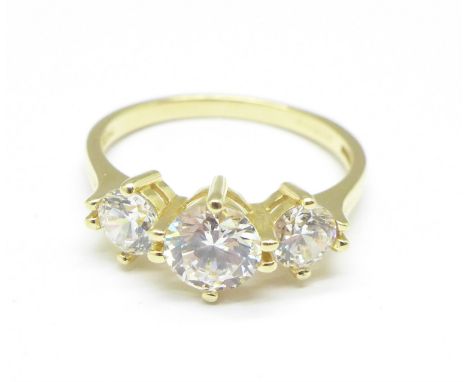A 14ct gold white sapphire trilogy ring, 3g, P