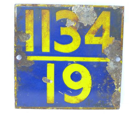 An enamel railway sign marked 1134/19