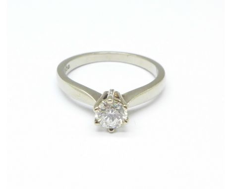 An 18ct white gold, diamond solitaire ring, 3.3g, L