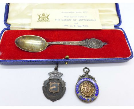 A silver and enamel Notts Football Alliance fob medal, Cup Runner Up, 1928-9, one other silver fob medal and a cased silver 1