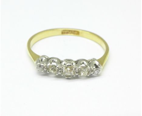 An 18ct gold, platinum set five stone diamond ring, 2.3g, M