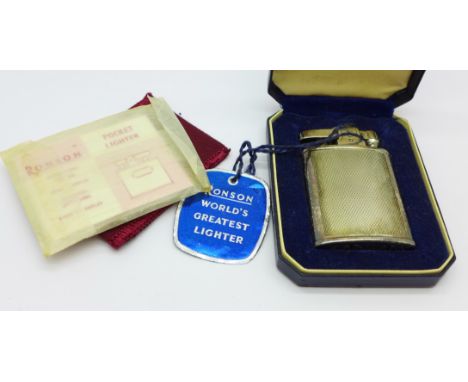 A silver Ronson lighter in original box with instructions