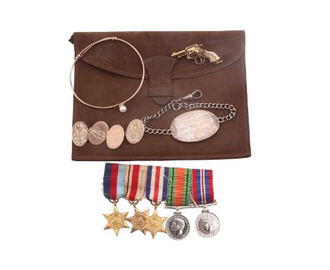 A small jewellery collection of military interest; to include a 9ct yellow gold revolver pistol charm, Chester 1961; a pair o