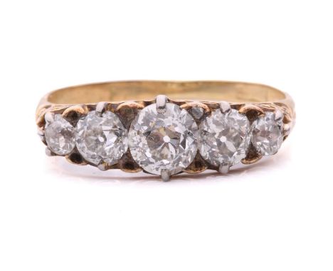 A late Victorian diamond five stone ring, set with a graduated row of old cut diamonds, with a total diamond weight of 1.30ct