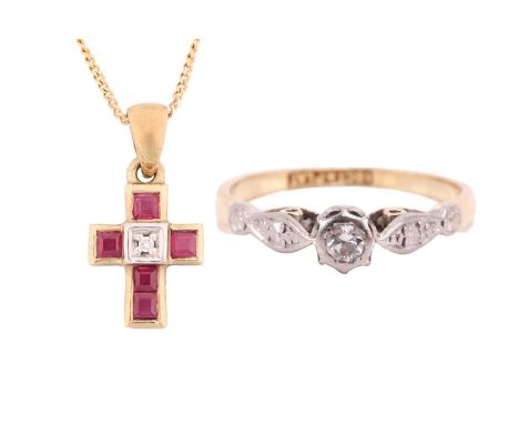 A diamond solitaire ring and a gem-set cross on chain; the ring contains a brilliant-cut diamond in a high-profile illusion m