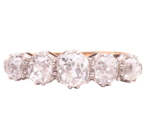 A diamond five stone ring, set with a graduated row of cushion shape old cut diamonds with a total estimated weight of 1.25ct