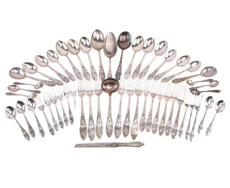 A composite set of Danish white metal flatware, Copenhagen, various dates and makers, each piece decorated with fruiting bran