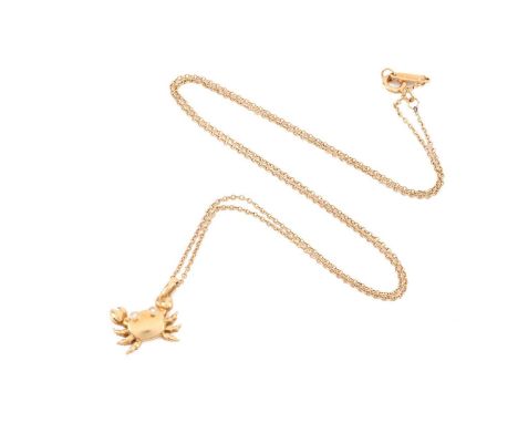 Tiffany &amp; Co. - an 18ct yellow gold crab charm pendant on chain, the stylised crab has diamond-set eyes, clawing a loop b