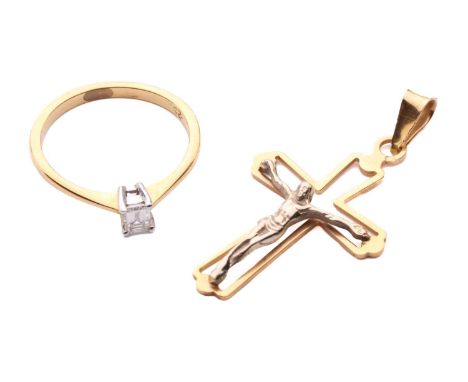 A diamond solitaire ring and a crucifix pendant; the 18ct gold ring centred with an emerald-cut diamond of 0.25ct, claw-set b