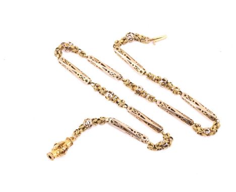 A 19th-century fancy link chain, consisting of pierced bar links flanking textured woven links, to a barrel clasp decorated w