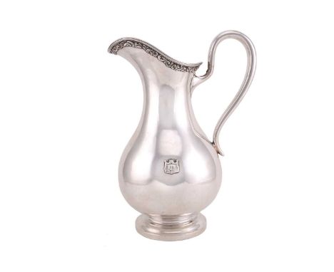 A Russian silver jug, 20th century, probably St Petersburg, with makers mark 'EB', of baluster form, the body raised on a cir