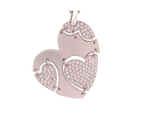 An 18ct white gold diamond-set heart pendant on chain, the concaved and heart-shaped pendant in sandblasted finish, designed 