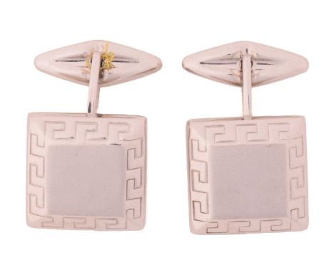A pair of square cufflinks, the bevelled head centred with a brushed finish panel, framed with a Greek key border, fitted wit