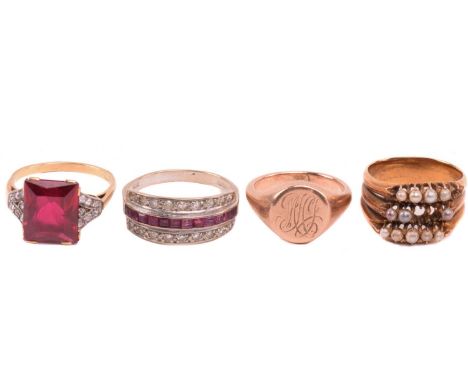 Three gem-set rings and a signet ring; the first comprises a row of channel-set table-cut rubies in the centre, flanked by tw