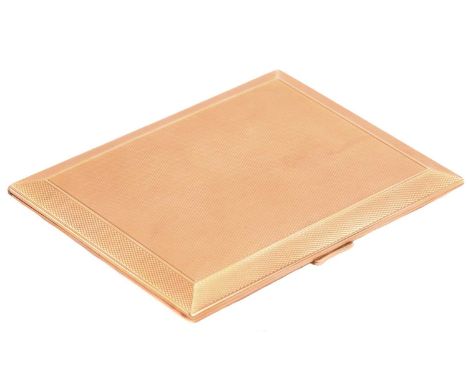 A 9ct yellow gold cigarette case of rectangular form, with engine turned pattern and push button opening, interior engraved '