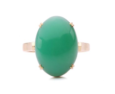 A chrysoprase ring, centred with an oval chrysoprase cabochon in a double-claw setting, approximately measures 18.1 x 13.0 mm