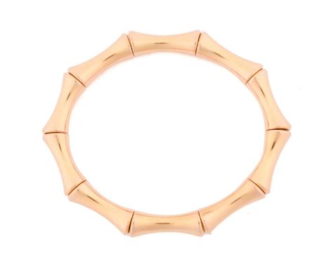 Gucci - a 'Bamboo' bracelet, a flexible and expandable bangle composed of links as stylised bamboo culm, signed and struck wi