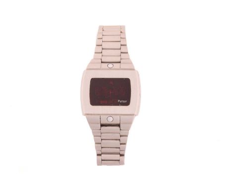A Pulsar LED Time Computer watch, featuring a battery-operated digital display in a steel case measuring 33.5mm with a red LE