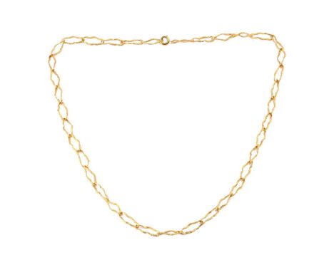 A textured peanut link chain, organically textured, connected by a gilt spring-ring clasp, yellow metal testing 18ct, overall