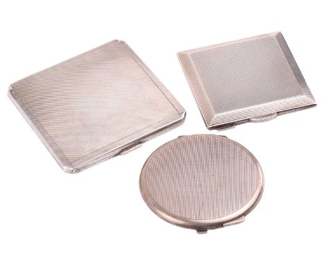A silver compact; square engine-turned Birmingham 1959, a circular compact and an engine-turned cigarette case. Gross weight 