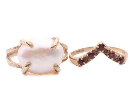 A pearl ring and a gem-set wishbone ring; the pearl ring features a button-shaped cultured pearl of white colour with rose ov
