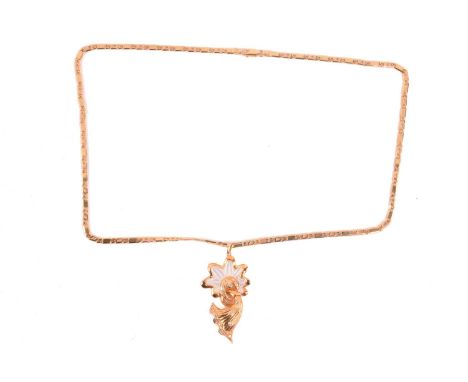 A diamond and mother of pearl pendant, the abstract design set with round brilliant cut diamonds and carved mother of pearl, 